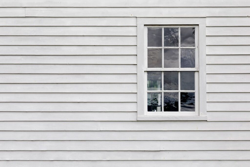white siding house